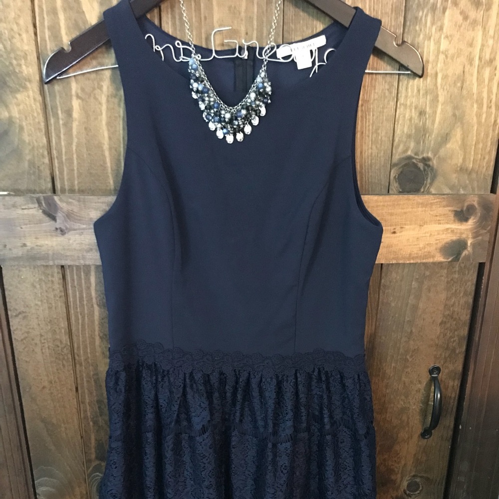 Beautiful skater style dress with lace bottom